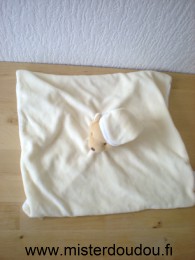 Doudou Ours Noukie s Jaune dessus tissus blanc dessous 