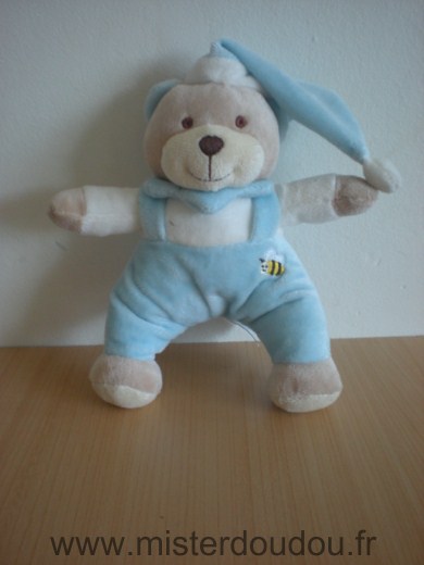 Doudou Ours Soft friends Blanc salopette bleu bonnet bleu avec une abeille brodee 