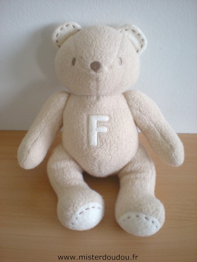 Doudou Ours Sucre d orge Beige avec un f 