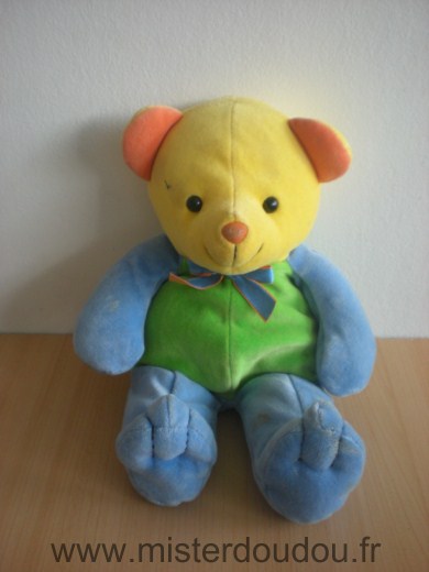 Doudou Ours Toys r us Vert bleu jaune orange En tres bon état mais une trace derrière le bras et la jambe