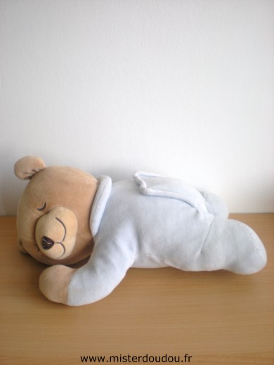 Doudou Ours Tummy sleep Bleu Possède une poche vide sous le ventre fermée par un scratch