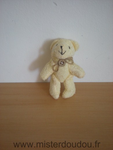 Doudou Ours - marque non connue - Mini ours jaune avec un bouton dans le cou 