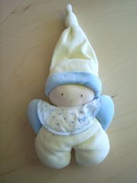 Doudou Poupée Corolle Jaune bleu 