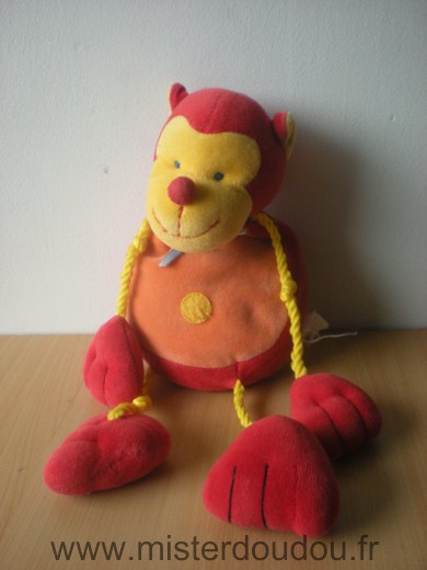 Doudou Singe 0 Rouge orange bras jambes en cordon jaune 