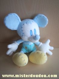 Doudou Souris Disney Blanc bleu jaune pastels Mickey

etiquette coupée, marque disney??