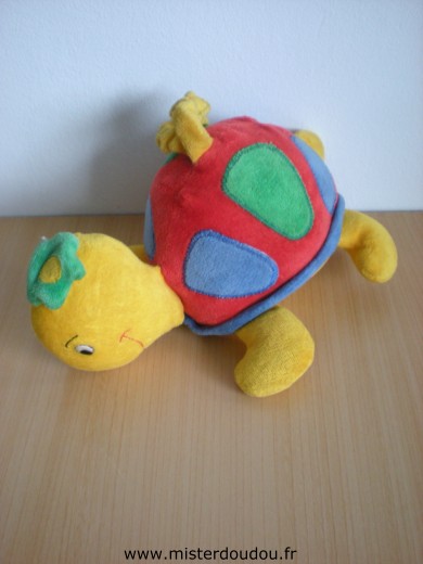 Doudou Tortue Fehn Rouge jaune bleu vert 