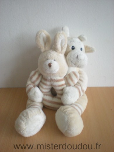 Doudou Vache Ajena Vache écrue tenant lapin hochet 