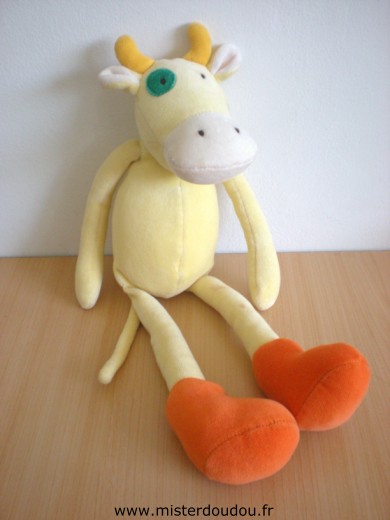 Doudou Vache Moulin roty Vache marguerite jaune sans sa robe Mais une petite trace dans le dos