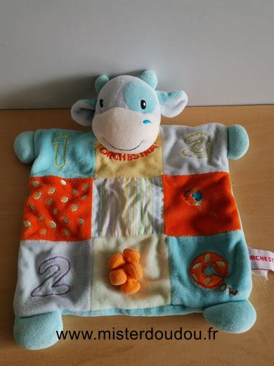 Doudou Vache Orchestra Bleu orange jaune 