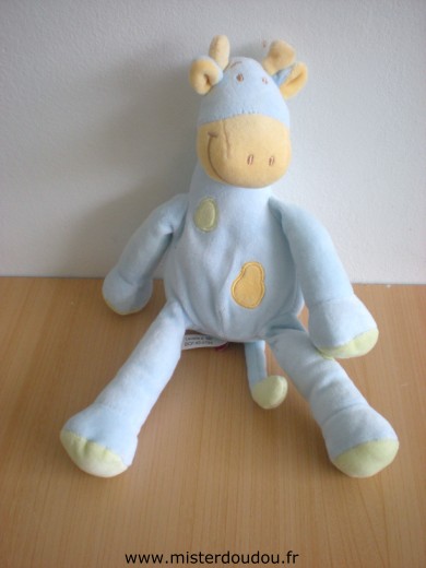 Doudou Vache Tex Bleu taches jaunes foulard vert 