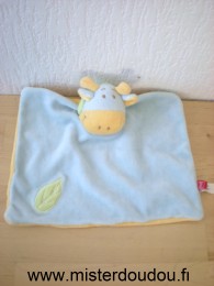 Doudou Vache Tex Vache ou girafe bleu dessus feuille verte , jaune dessous 