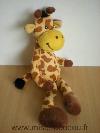 Girafe-Mgm-Jaune-taches-marron-Etiquette-coupee-marque-supposee-mgm