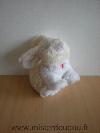 Lapin-Gipsy-Blanc-jaune-Sonore-quand-on-appuie-sur-son-ventre